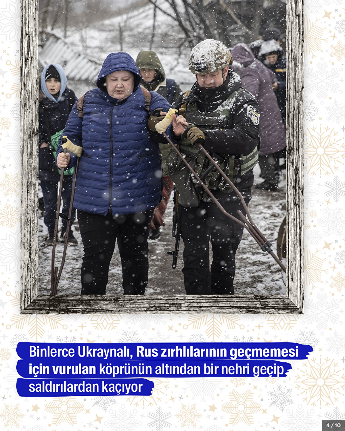 Binlerce Ukraynalı, Rus zırhlılarının geçmemesi için vurulan köprünün altından bir nehri geçip saldırılardan kaçıyor.<br>