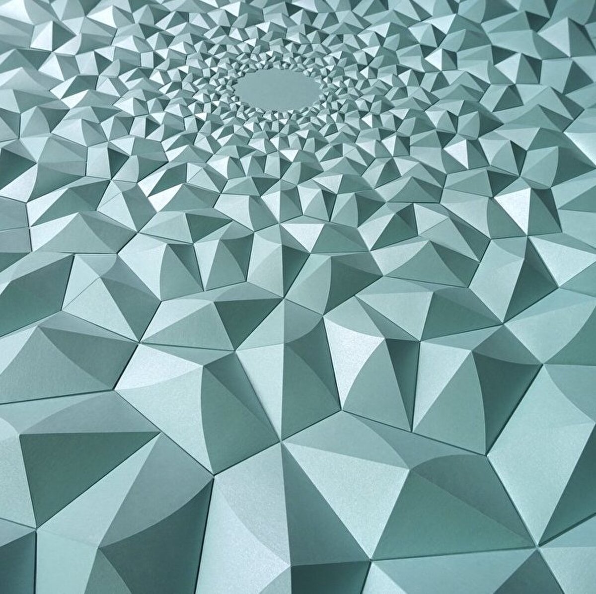 İlk olarak, Shlian’ın kağıt heykelleri hücrelerdeki karmaşık yapıları ve hareketlerini tanımlamak için kullanılmış, sonrasında güneş paneli projesi çalışmalarına dahil olarak kağıt araştırmanın bir parçası haline gelmiş. Bu projede tasarlanan kağıt yapıların güneşin hareketlerini kullanarak güneş panellerini daha verimli hale getirdiği çalışmanın sonucunda ortaya çıkmış.