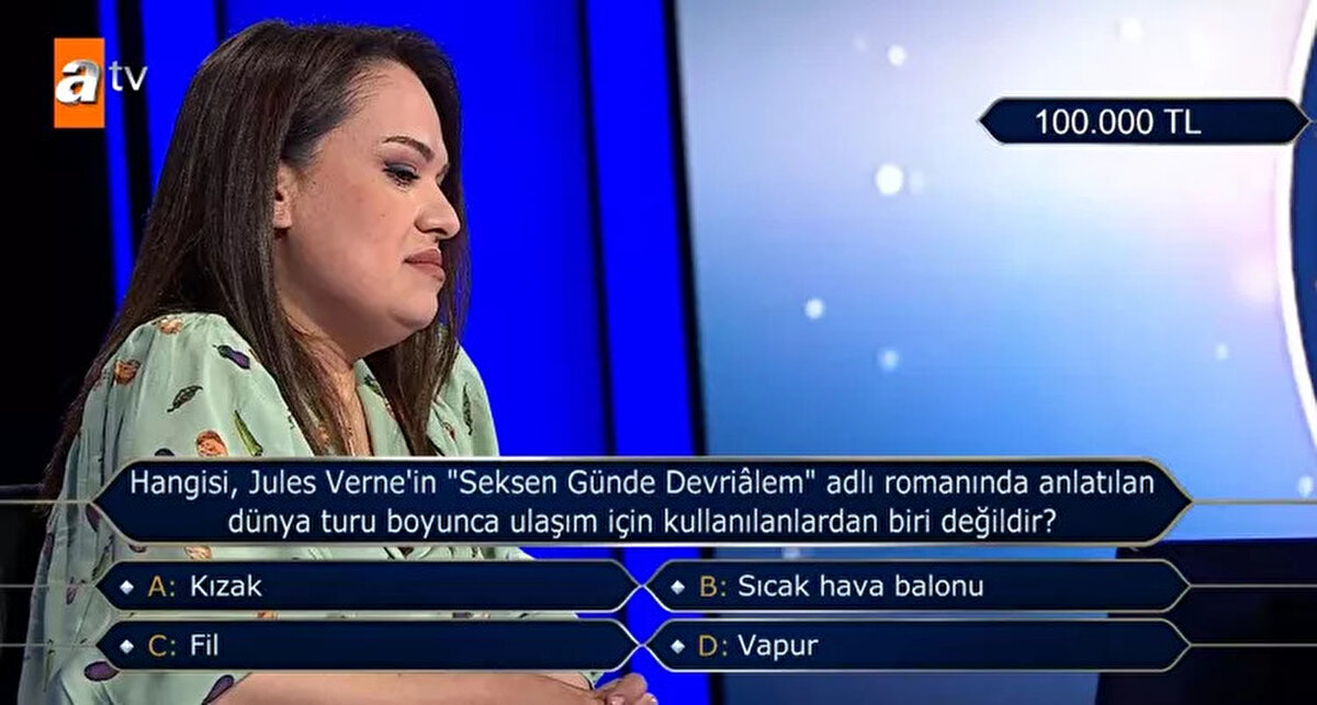 100.000 TL değerindeki 9. soruya ulaşmayı başaran Sağlam'ın karşına çıkan "Hangisi, Jules Verne'in 'Seksen Günde Devrialem' adlı romanında anlatılan dünya turu boyunca ulaşım için kullanılanlardan biri değildir?" sorusu yarışmacıyı şoke etti.<br><br>