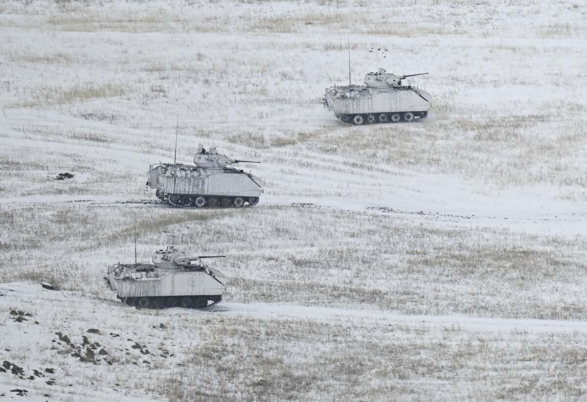 9. Kolordu Komutanlığı'nın sevk ve idaresinde, 14. Mekanize Piyade Tugay Komutanlığı tarafından Kars'taki Şehit İstikam Astsubay Kıdemli Üstçavuş İlhan Hamlı Atış ve Tatbikat Alanı'nda düzenlenen birleşik, müşterek kış tatbikatı kar yağışı altında devam ediyor.<br><br>
