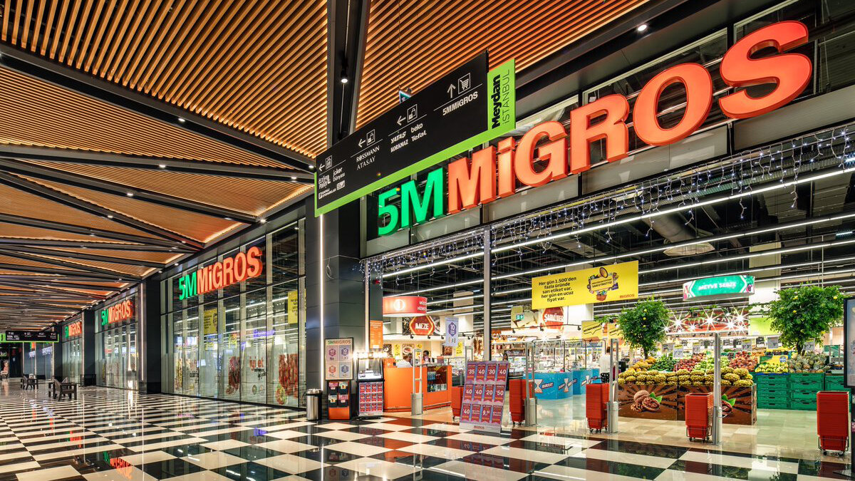 19) Migros