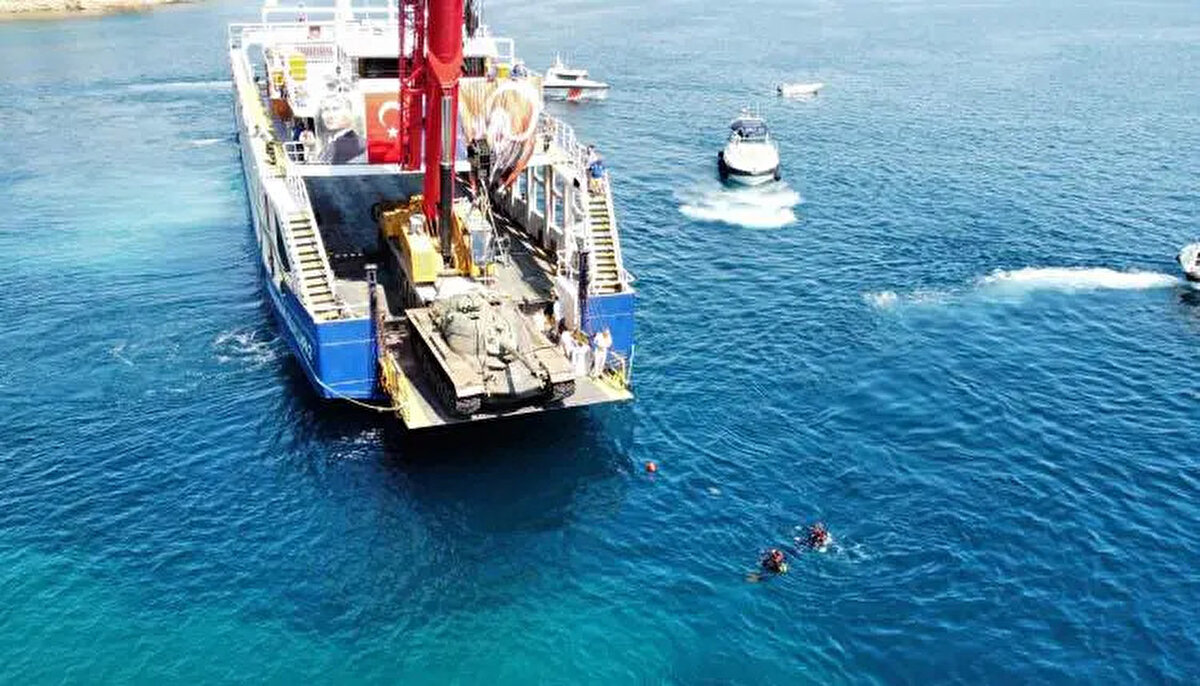 İnşallah bunu da kısa sürede bu yaz için yetiştireceğiz ve milletimizin buradaki yine dalış seven dalgıçlarımızın hizmetine burayı sunmuş olacağız" <br><br>