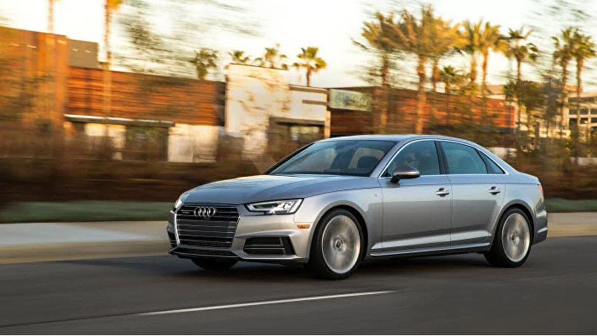 4. 2017 Audi A4 2.0T FWD<br><br>Yakıt Tüketimi (Uzun Yol): 6,4 L100 km<br>Menzil: 763 km<br>Premium bir deneyim arayanlara hitap eden Audi A4, zarif iç tasarımı ve yalıtımıyla uzun yollarda adeta bir sessizlik sunuyor. Konforlu koltukları ve sürüş rahatlığıyla, uzun saatler boyunca bile konfor seviyesini yüksek tutuyor.