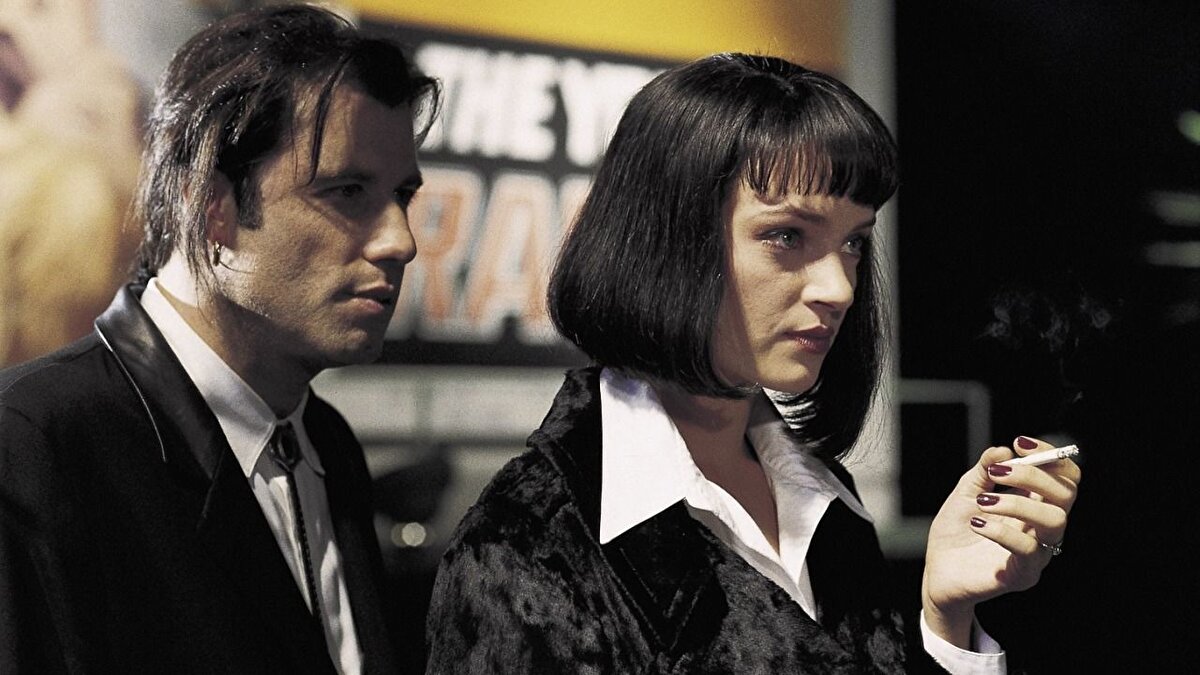 8. Ucuz Roman (Pulp Fiction, 1994)<br>Yönetmen: Quentin Tarantino<br><br>IMDb: 8.9<br><br>Tür: Suç, Kara Mizah<br><br>Öne Çıkan: Bölmeli hikâye anlatımı ve Tarantino'nun imza tarzı.