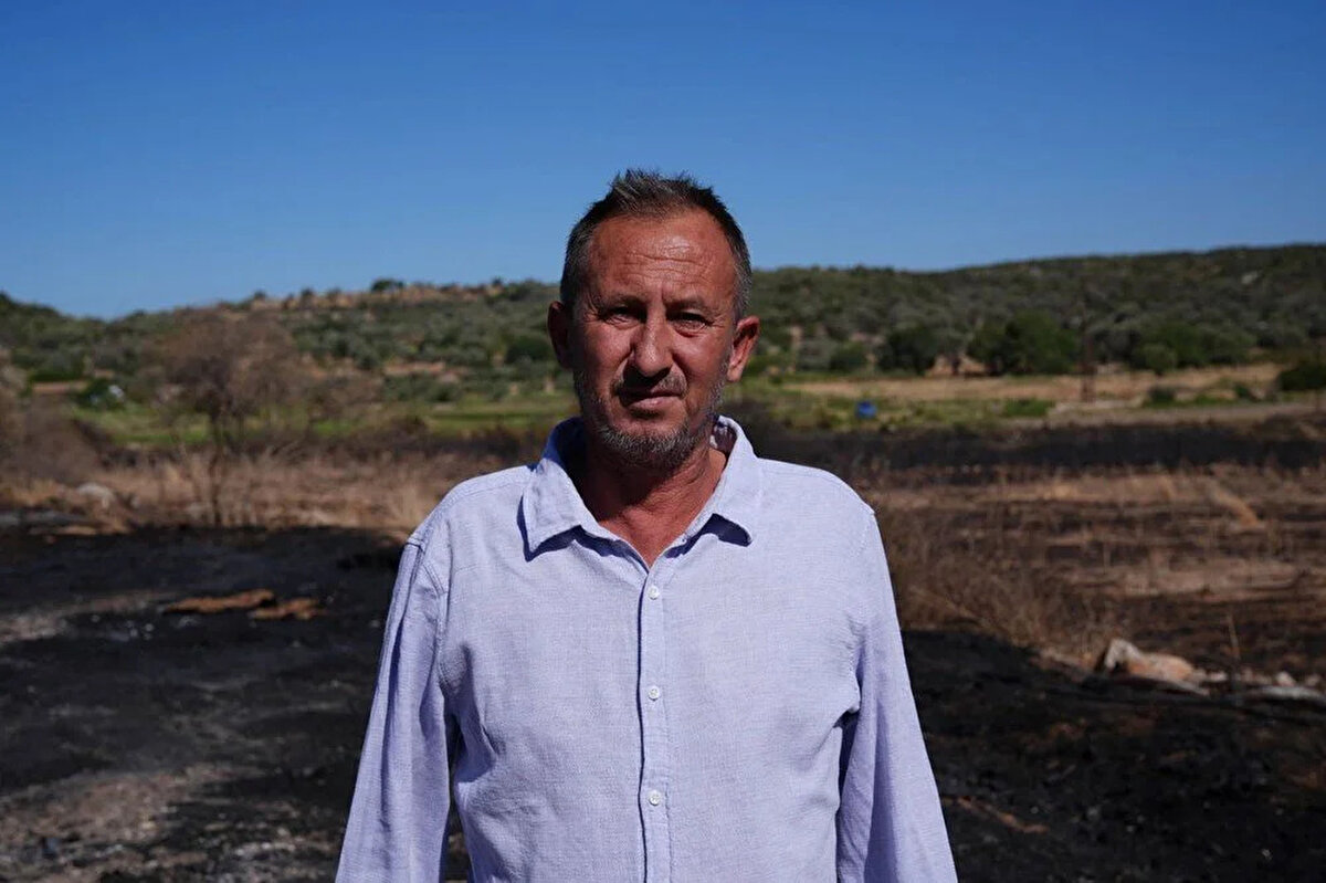 Ildır Mahallesi Muhtarı Erdem Yavuz, dumanları gören mahalle sakinlerinin haber vermesiyle yangın bölgesine geldiğini söyledi.<br><br>Yangın söndürme tankerleriyle alevlere müdahale etmeye çalıştıklarını belirten Yavuz, rüzgarın çok kuvvetli olması sebebiyle başarısız olduklarını ifade etti.