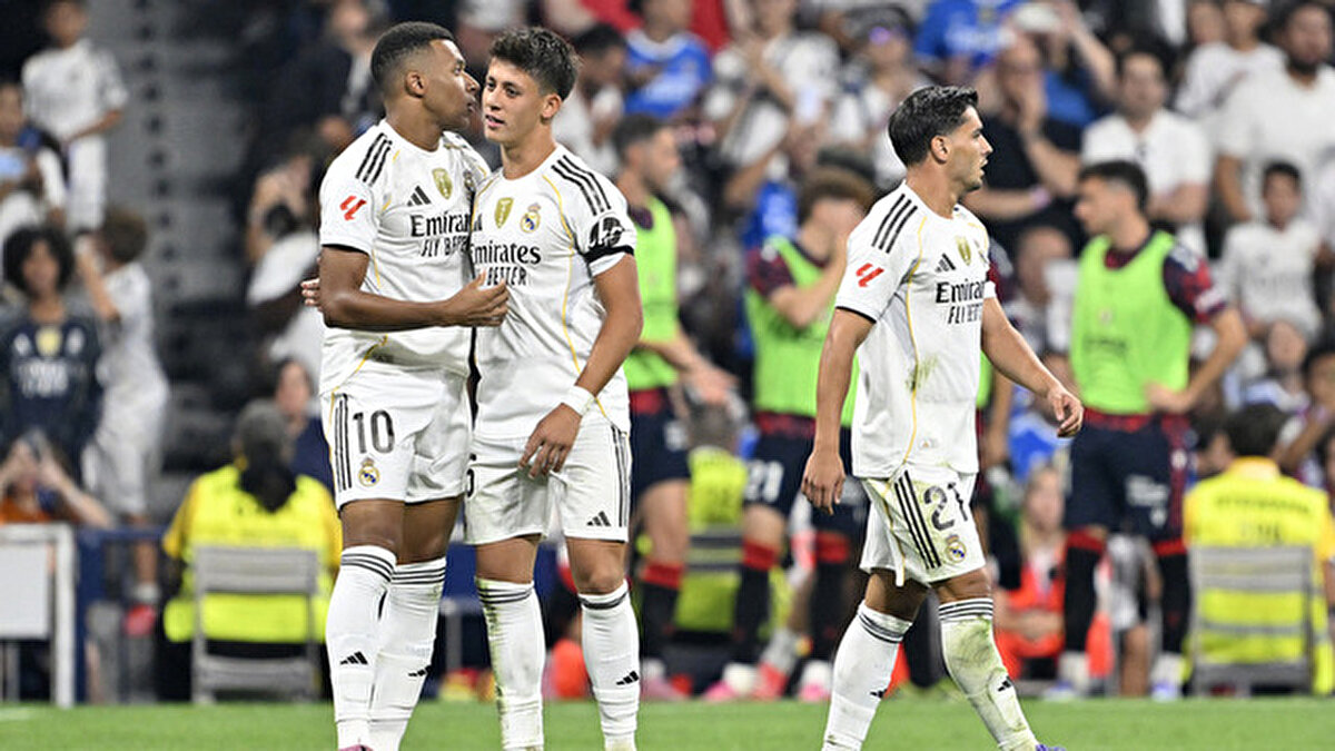 İspanya La Liga’da heyecan devam ediyor. Ligin ikinci haftasında Real Madrid, ilk haftada Osasuna’yı 1-0 mağlup eden formuyla Real Oviedo karşısında galibiyet peşinde. Futbolseverler, Real Oviedo - Real Madrid maçı canlı izle kanalı ve saatini merak ediyor. Milli futbolcu Arda Güler’in bu karşılaşmada ilk 11’de yer alıp almayacağı ise büyük bir tartışma konusu. İşte Real Oviedo - Real Madrid maçının tüm detayları, muhtemel 11’ler ve canlı izleme bilgileri…