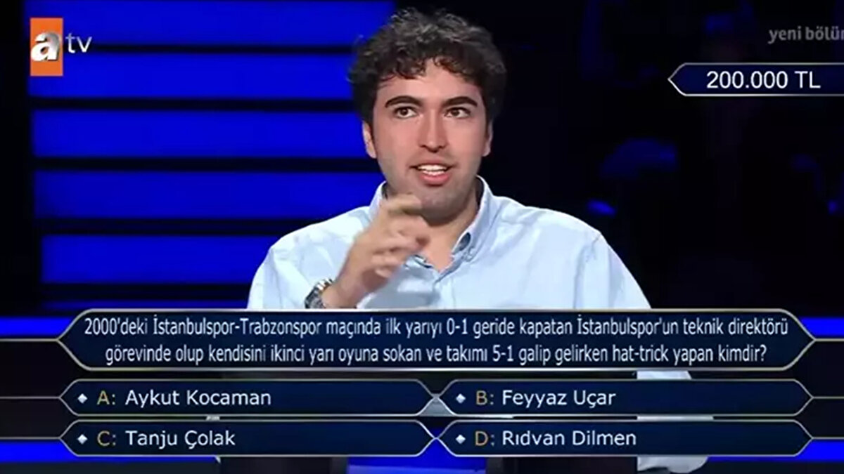 2000'deki İstanbulspor-Trabzonspor maçında ilk yarıyı 0-1 geride kapatan İstanbulspor'un teknik direktörü görevinde olup kendisini ikinci yarı oyuna sokan ve takımı 5-1 galip gelirken hat-trick yapan kimdir?<br><br>A) Aykut Kocaman<br>B) Feyyaz Uçar<br>C) Tanju Çolak<br>D) Rıdvan Dilmen<br><br>Cevap: A) 