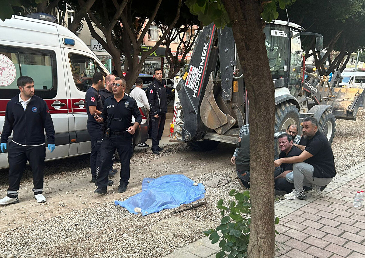 Operatör kısa süre sonra teslim oldu<br>Kazanın ardından bölgeden ayrılan kepçe operatörü Erkan G., kısa süre sonra geri dönerek polis ekiplerine teslim oldu. Gözaltına alınan operatör, polis merkezine götürüldü. Okan Işık’ın cenazesi, olay yeri incelemesinin ardından Antalya Adli Tıp Kurumu’na kaldırıldı.