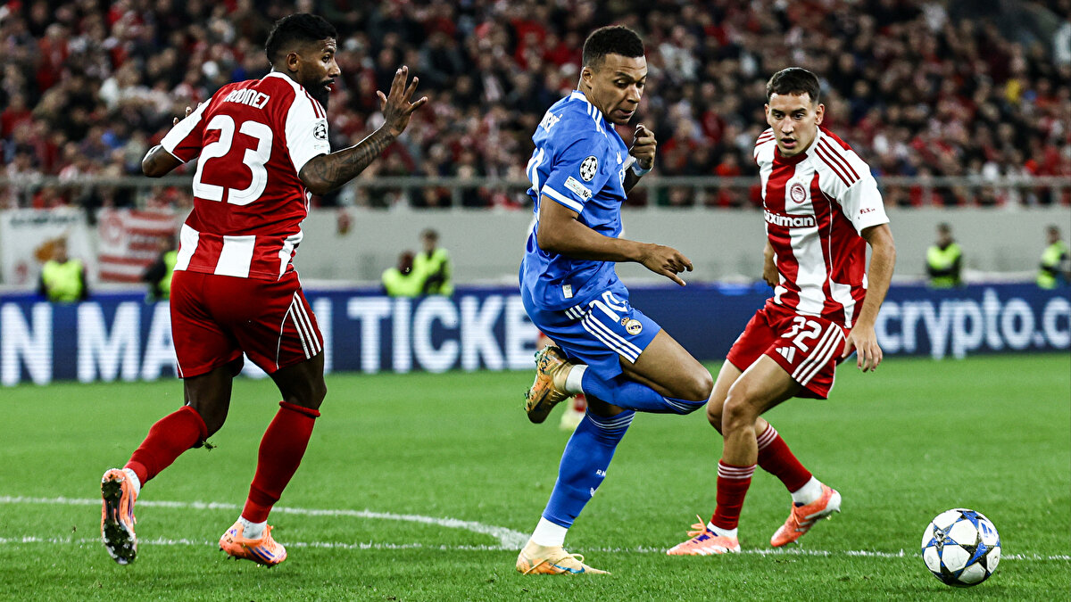 YUNANİSTAN'DA GOL DÜELLOSU<br><br>Şampiyonlar Ligi'nin favori takımlarından Real Madrid, zorlu deplasmanda Yunan devi Olympiakos'a konuk oldu. 