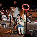 En Chine: des streameurs campent dehors en quête de pourboires