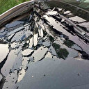 Apartmandan atılan kemik parçası otomobilin üzerine düştü