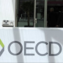 L'inflation et les taux vont peser sur la croissance mondiale en 2024, avertit l'OCDE