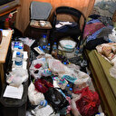 Yalnız yaşayan kadının evinden iki kamyon çöp çıkarıldı