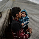 Mohammed El-Yazici, Palestinien de 14 ans avec son petit frère à Rafah.