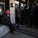 Esed giderken hazineyi boşalttı: Suriyeliler mağdur