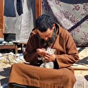 Rim'in dedesi Halid Dede yavru kediye şırıngayla su içirirken görüntülendi