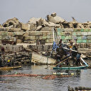 Les palestiniens continuent de pêcher dans le port dévasté de Gaza
