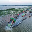 Chine: Bataille pour combler une brèche de 226 mètres dans le barrage du deuxième plus grand lac d'eau douce