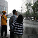 En Chine, des pluies torrentielles font au moins 30 morts, canicule à Shanghai