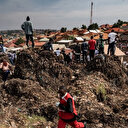 De la "panique" à la colère: en Ouganda, des habitants choqués après l'effondrement d'une décharge