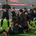 Ligue des champions: l'Atlético renverse Leverkusen, le Barça s'impose au terme d'un match fou