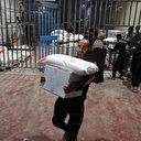 UNRWA distribue des colis d'aide aux Palestiniens à Gaza