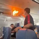 Air China uçuşundaki korku dolu anlar kamerada: Uçak havadayken kabinde yangın çıktı