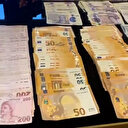 Murat Ongun'un evinde çıkan yüklü miktarda para ve av tüfekleri dikkat çekti