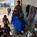 Gazze'de bayram öncesi çocukları tıraş ettiler