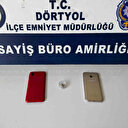 Ehliyet sınavında kopya çekmek isteyen şahıs kulaklığı takarken yakayı ele verdi