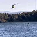 Gölette tehlikeli ve heyecanlı saniyeler: Helikopter ile kayık karşılaştı