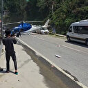 Arızalanan helikopter acil iniş yaptı: İniş sırasında kuyruğu bir otomobile çarptı