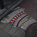 Fransız sokak sanatçısı 'şehirlerin yaralarını' mozaikleriyle örtüyor