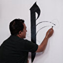 İki yılda 20 caminin duvarlarını ayet ve işlemelerle süsledi: Çizimler camiye farklı bir hava kattı