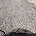 Motosikletli sürücü İzmir'in bozuk yollarını İzmir Marşı ile tiye: Melodili yol olduğunu biliyor muydunuz?