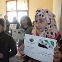 Suriyeli sığınmacı çocukların karne heyecanı