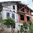 Baba mirası evi ortadan ikiye bölüp paylaştılar