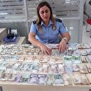 Dilenciden 15 ülkeye ait para çıktı