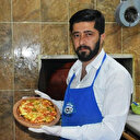 Çocuklar için alabalıklı pizza yaptı