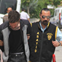 Boynundaki dövme sayesinde yakalandı