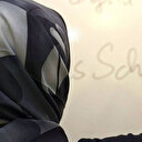 Belçika'da okula başörtülü gidebilmek için açtığı davayı kazandı