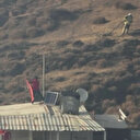 Yangını görünce eşyaları bırakıp Türk bayrağını kurtardı