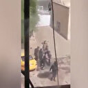 Irak'ta maskeli grup protestocuları öldüresiye dövdü