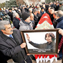 Eşinin yanına konuldu