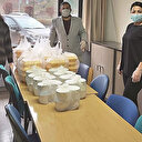 Gurbetçilerden örnek çalışma: Doktorlara pilav ve kavurma ikram ettiler