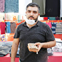 Pazarda bulduğu para ve altın dolu cüzdanı sahibine teslim etti