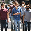 Bakan Koca: Virüs yan yana yürürken geçebilir