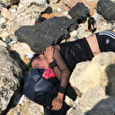 İstanbul'da genç kadını dövüp kayalıklara attılar