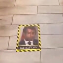 Kuveyt'te bir restoran yerleri Macron'un fotoğrafıyla "süsledi"
