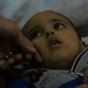 İsrail bombardımanı sonrası şok içerisindeki bir çocuğun görüntüsü izleyenleri derinden etkiledi